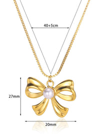 Pearl Centre Gold Bow Pendant Necklace - view 1