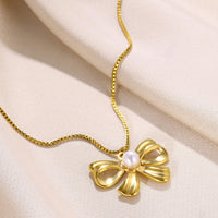 Pearl Centre Gold Bow Pendant Necklace - view 2