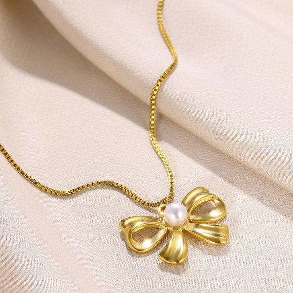 Pearl Centre Gold Bow Pendant Necklace
