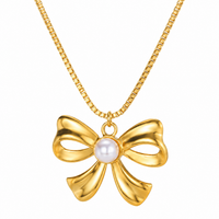 Pearl Centre Gold Bow Pendant Necklace - view 1