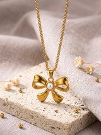 Pearl Centre Gold Bow Pendant Necklace - view 2