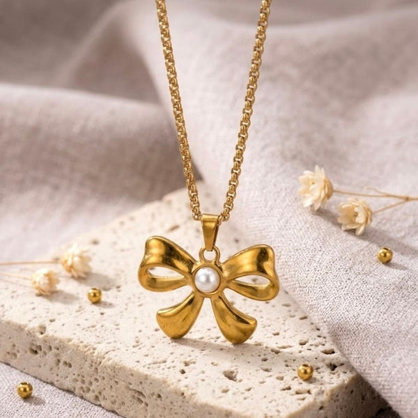 Pearl Centre Gold Bow Pendant Necklace